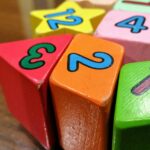 Close-up view of colorful wooden blocks with numbers for educational use.